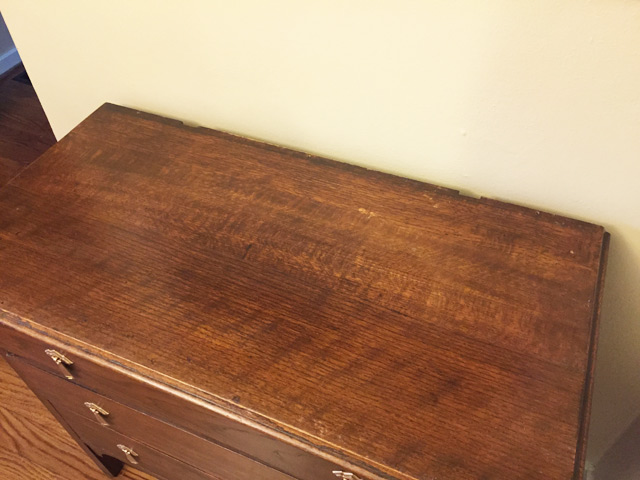 wide shot of top of wood dresser furniture