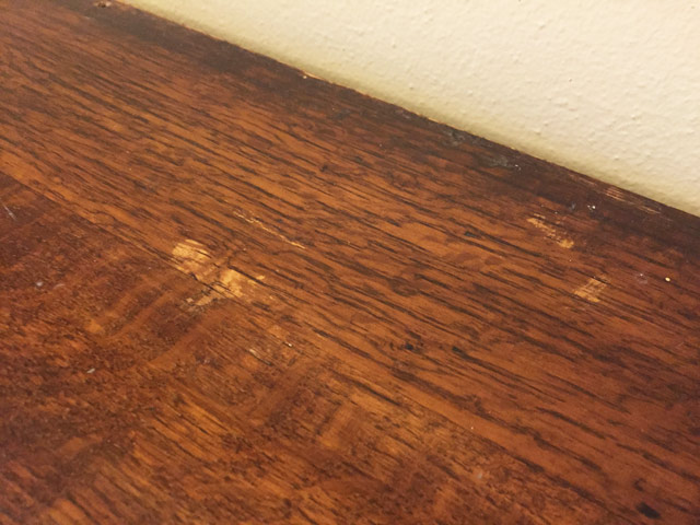 spots on top of wood stained dresser furniture