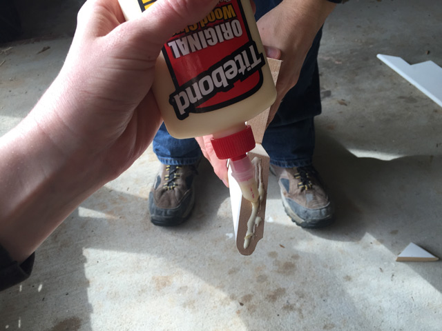 titebond red wood glue applying to window stool joint